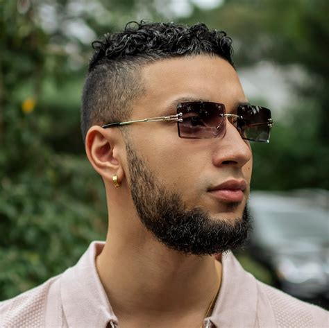 cartier glasses rapper